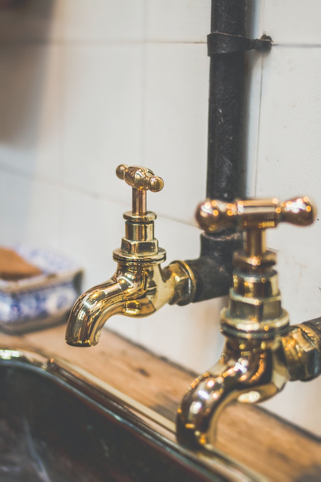 bronze kitchen sink handles and pipes